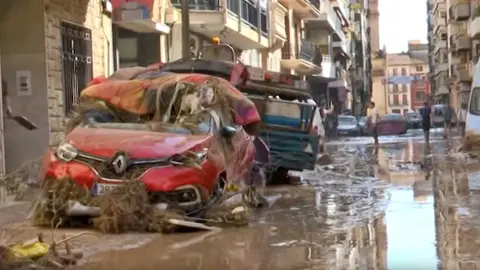 Una calle de Algemes&iacute;, tras la DANA | Imagen: Berca TV